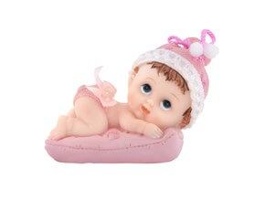 Figurine Bébé Fille sur un coussin rose