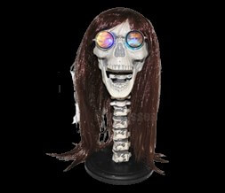 Tête de squelette avec perruque et lunettes lumineuse 43cm